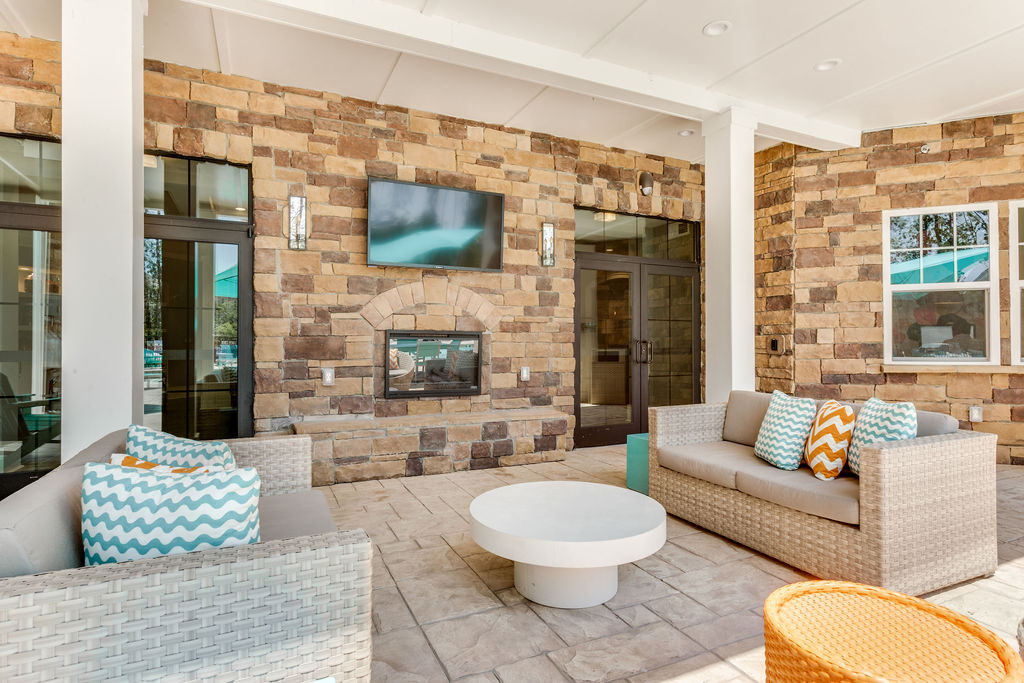 Outdoor Lounge area with television